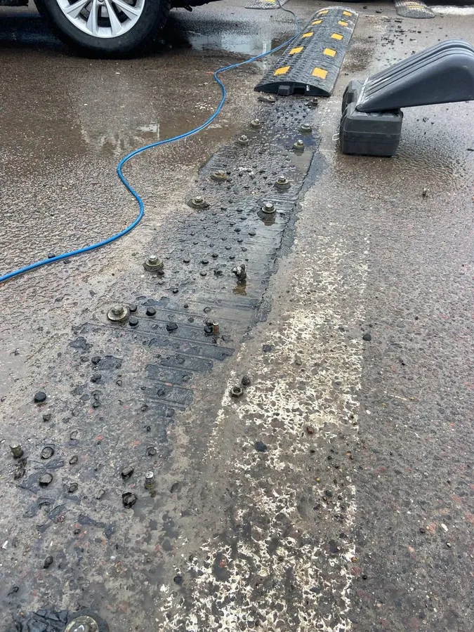 Old speed bump lifted, anchors ready for the new one